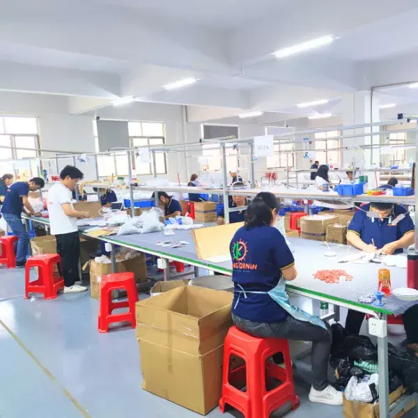 FLOSEEK workers assembling lighting products at workshop benches